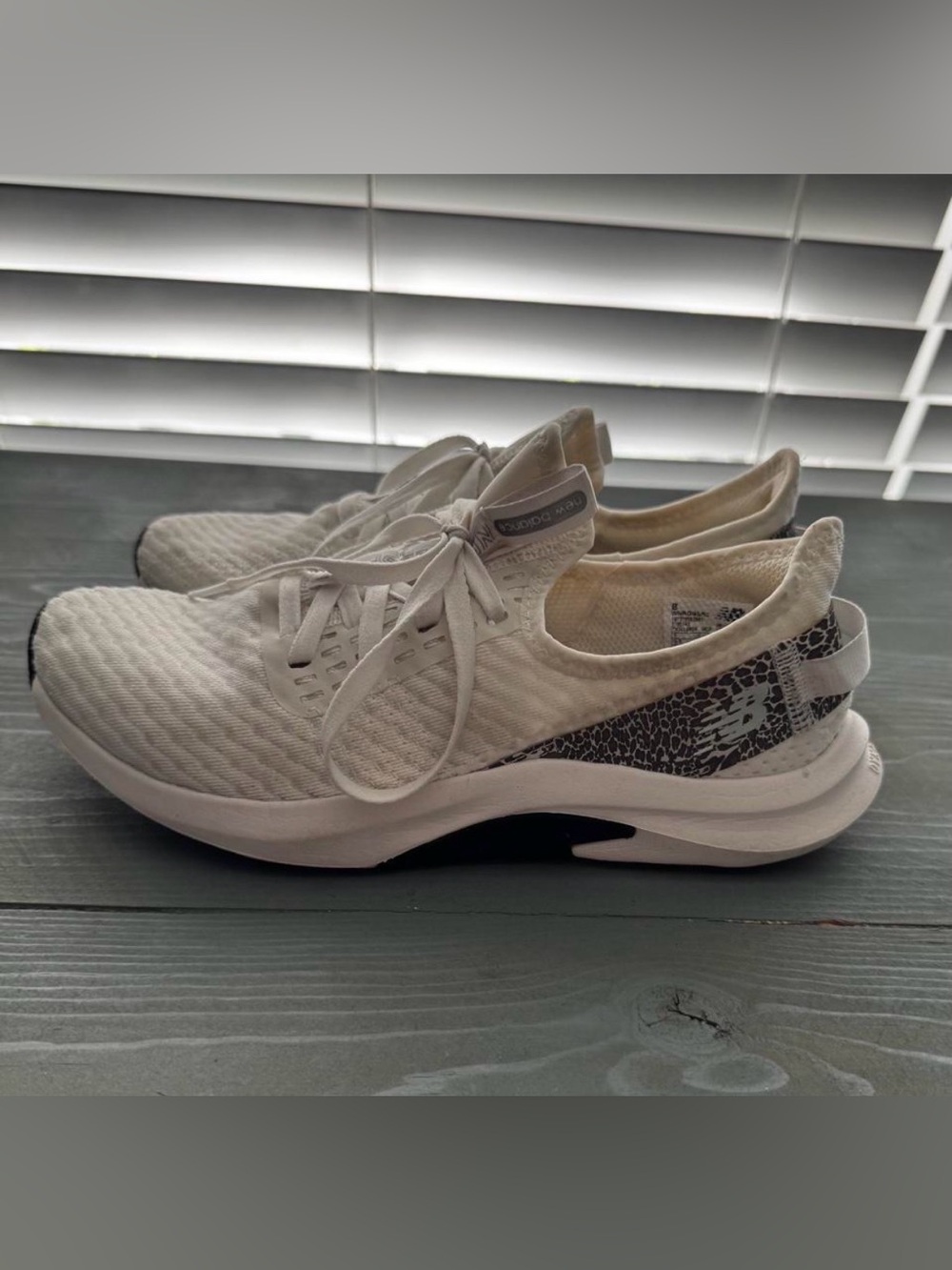 New Balance Women's White Athletic Slip-On Sneakers with Black Accent